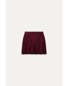 PLEATED MINI KNIT SKIRT